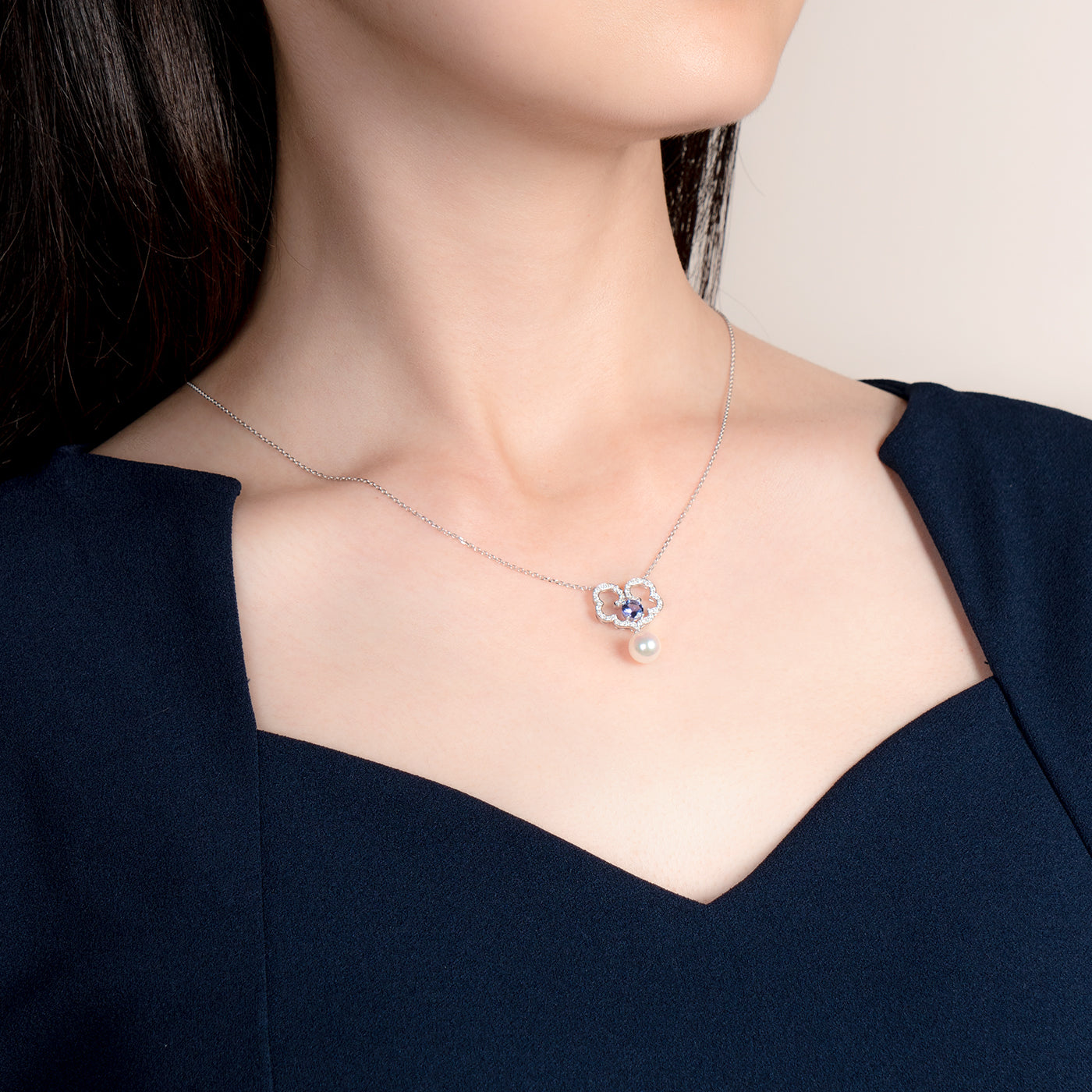 The Timeless Blessings Necklace 18kt White Gold with Tanzanite and Diamond Model | Shen Yun Shop